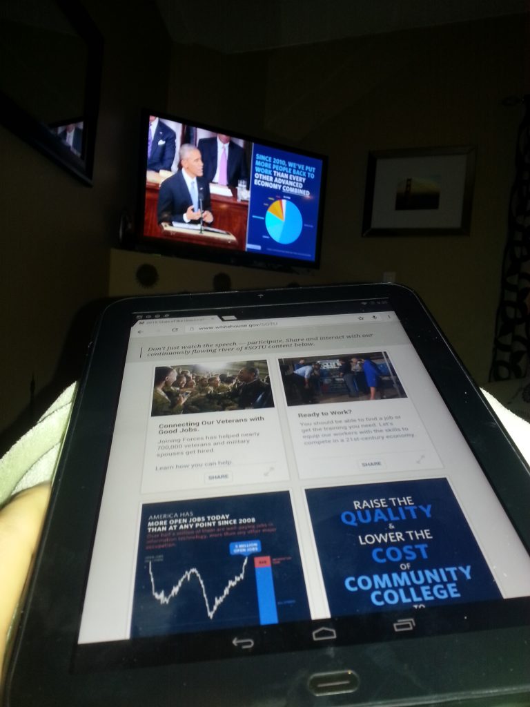 Simultaneously watching the SOTU on Youtube with sidebar content and companion tablet content.